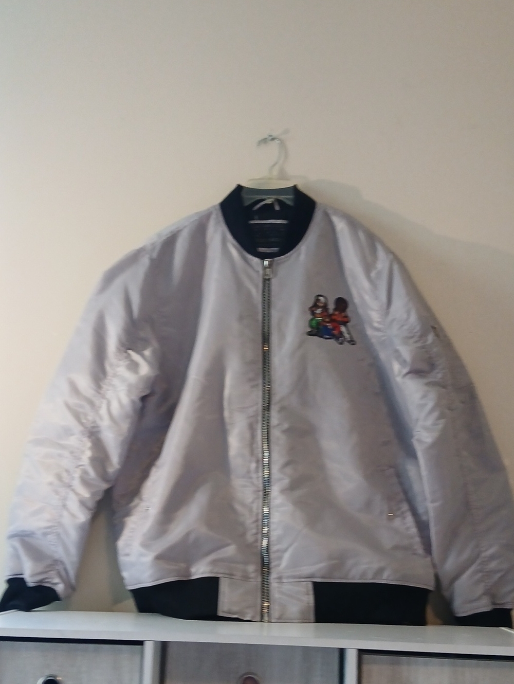 Light Silver Bomber Jacket with Embroidered Patch